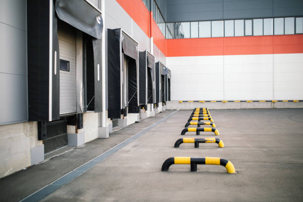 Warehouse exterior, featuring loading bays